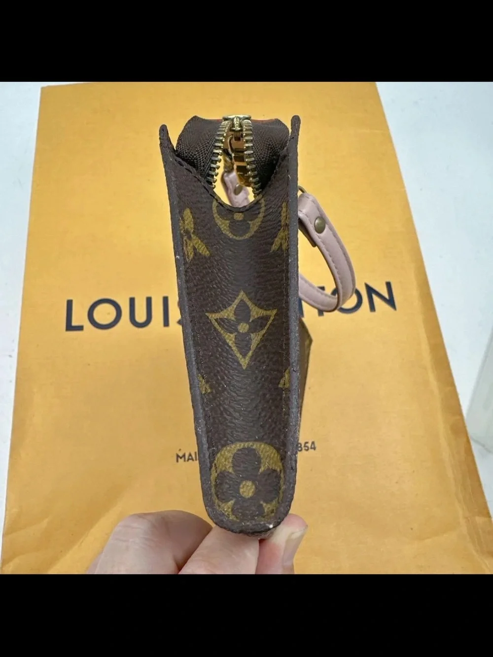 Louis Vuitton Monogram Mini Pochette in Brown with Natural Strap